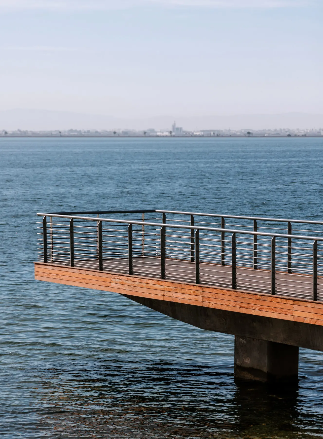 Wooden pontoon reaching out over the North Lake of Tunis